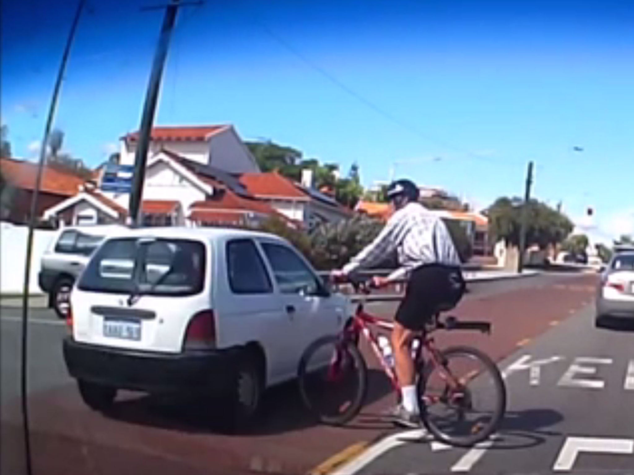 Watch A Cyclists Nearmiss With A Car In Australia The Independent